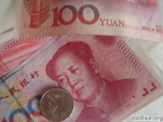 Китай продлит валютные торги для глобализации юаня